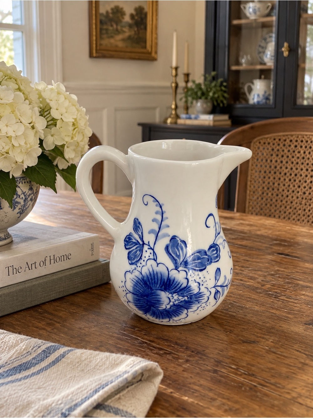 Andrea By Sadek White Ceramic Pitcher with Blue Floral Motif
